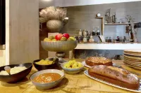 羅馬諾飯店 - 早餐