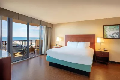 La Quinta Inn & Suites by Wyndham Cocoa Beach Oceanfront Hotels near Cocoa Beach Public Library