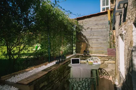 Roompedra Apartamentos turísticos Отели рядом с достопримечательностью «Miradoiro Costa Vella»