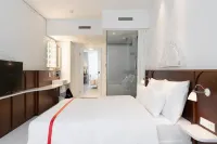 روبي ميمي هوتل زيورخ باي آيتش جي - شرفة