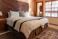 Hotel Nomad Belvedere Lodge فنادق في ميدراند
