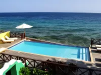 Scuba Lodge & Suites - de playa