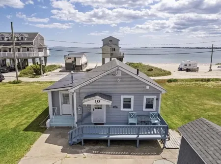 Beach Lovers Paradise!  Cozy 3 bedroom home steps from the beach.