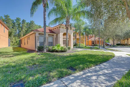 Modern clean home with private pool covered patio, game room and close to Disney