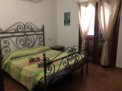 Villa with panoramic pool surrounded by greenery Hotels near Porto Pollo