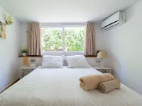 Apartment in Maspalomas with spacious garden, 30 m to the beach. Private garage Hotels in Meloneras