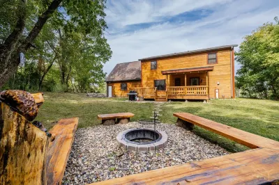 Elina’s  Log Cabin, new on the market, steps from Devil’s Lake State Park.