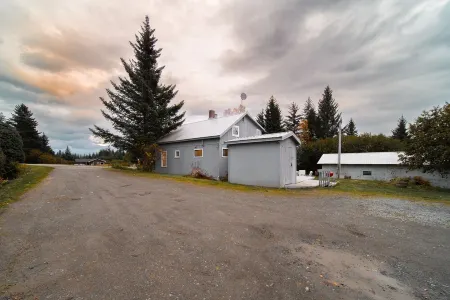 Historic Bungalow on Centrally Located Half-Acre Private Lot