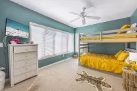 Private townhome steps from the beach and right next to the pool