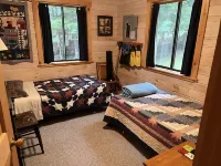 Cozy  Sebec Lake front cabin with dock and fire pit