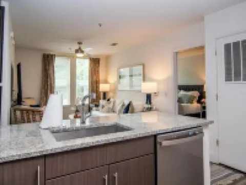 Walk to the square and the grove! This 2BR 2BA is the perfect location.