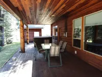 REMOTE CABIN WITH HOT TUB, MOVIE THEATER AND HUGE COVERED DECK WITH FIRE TABLE