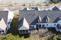 Minutes from Bethany Beach, sleeps 14, pools, golf, tennis beach shuttle & more