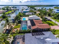 Luxurious Waterfront Retreat! Oversized Heated Pool and expansive outdoor area! Hotels near Endless Summer Adventures