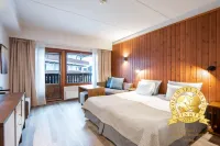 Ski-Inn RukaVillage فنادق في كوسامو