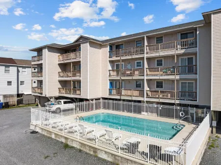 Steps to the Beach and Refreshing Pool - Inviting Coastal Haven