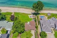 Luxury Lakefront Home w/ Private Hot Tub, Large Yard, Association Beach & WiFi