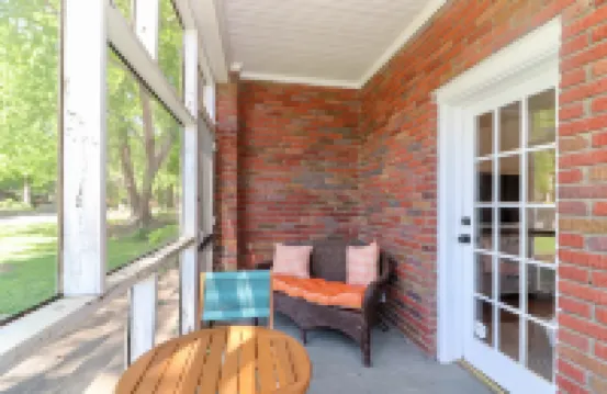 Modern Amenities and Cozy Screened Porches - Charming Historic Retreat