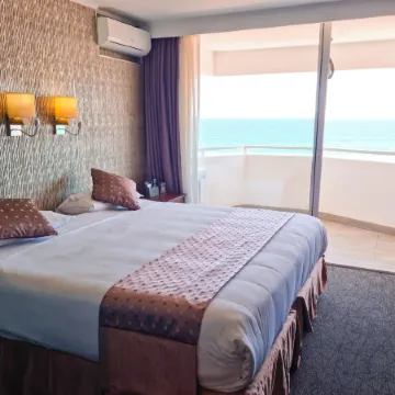 Hotel Espacio Ox & Convention Center Отели рядом с достопримечательностью «Пляж Каванча»