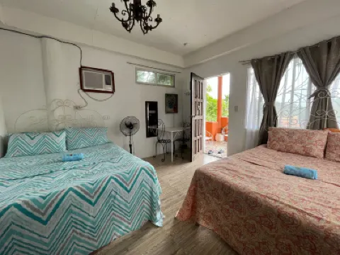 輕鬆花園度假村 鄰近Tangke Saltwater Lagoon的酒店