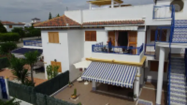 Living room with balcony and sea view, waterfront and south-facing