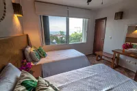 Awesome 2 BDR apartment, safe, clean, WiFi, and only  steps from the beach.