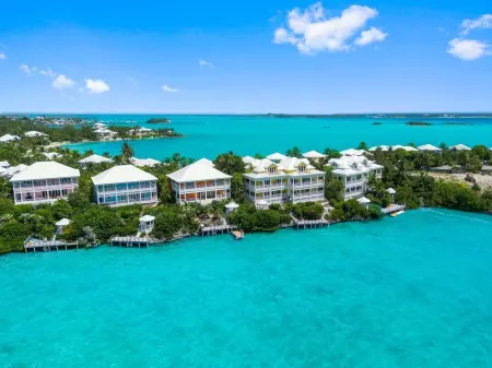 Waterfront Villa with Dock, Walk to Beach Club & Rusty Anchor Rest. 3b/r  3.5b/a