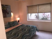 Quiet and serene ocean front 2-bedroom 2-bathroom condo, steps from the sand!