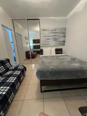 Cozy Apartment in San Juan with light 24/7 Hotels near Paseo Las Cumbres Shopping Center