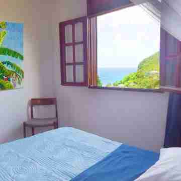 Up there in the garden - Villa with sea and mountain views - Deshaies Rooms