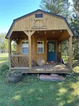 BEAUTIFUL lake front home with a private beach, dock and large yard