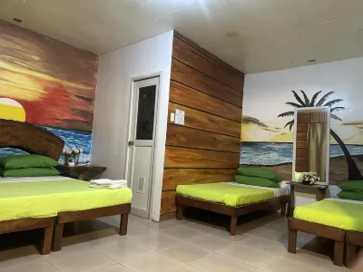 Maru's Beachfront Rooms