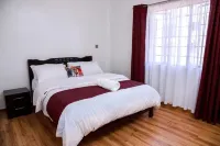 Cozy 2-BR Aprt with Pool, Gym at Tatu City Hotels in Kiambu