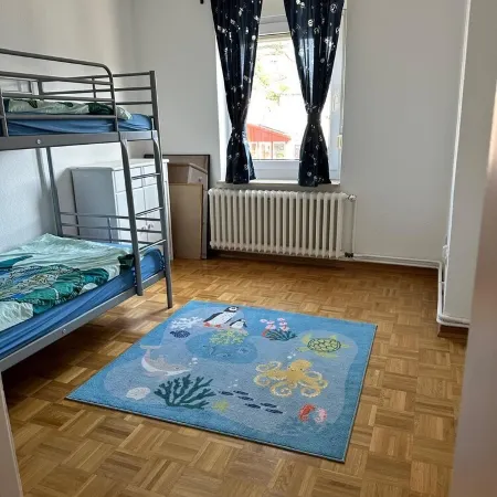 Large apartment in the center of Plön within walking distance to the lake/shops. Children's room