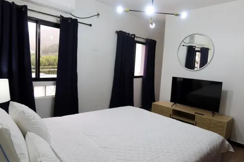 Renovated and cozy 2-bedroom apartment with AC, WiFi in vibrant San Pedro Sula