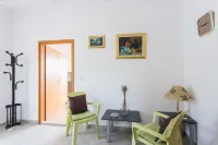 Apartments Villa Maslina - Two Bedroom Apartment with Terrace and Garden View Hotels in Cilipi