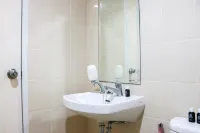 Simply 2BR Apartment at Parahyangan Residence By Travelio