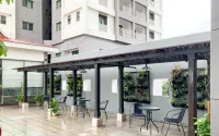 Modern Look with Wooden Accent 3BR at Kondominium Puncak Marina Apartment By Travelio
