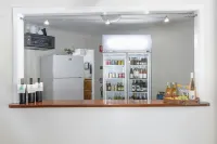 Mossman Resort Holiday Villas - bar