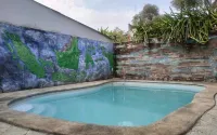 O3 Homestay Hotels in Batu