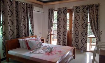 Buena's Haven Travelodge - Housity