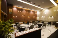JP Airport Hotel Kannur Hotels near Njattuvayal Forest