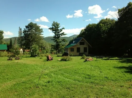 RESTORED HISTORIC ADIRONDACK CAMP: VIEWS OF NEARBY GORE MOUTAIN, PRIVACY, HISTOR