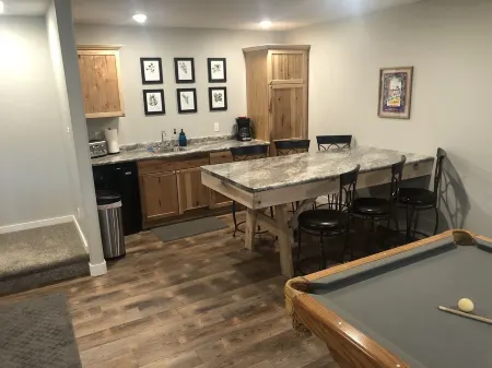 Spacious home with Hot Tub, bikes, fire pit, pool table and more!!