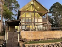 Lake House with pool + hot tub on Golf Course with boat dock
