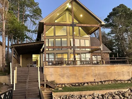 Lake House with pool + hot tub on Golf Course with boat dock