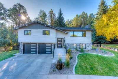 Modern home with privacy of the hills right in town!