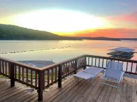 AMAZING WATERFRONT HOME WITH HOT TUB. BOTH HAVE EXTENSIVE VIEWS OF THE LAKE