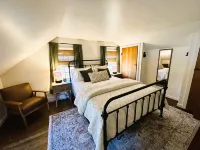 Rocky Branch Retreat on 33 acres with fenced yard, fireplaces & deck