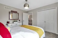 View of Lake Fenton with hot tub and fire place